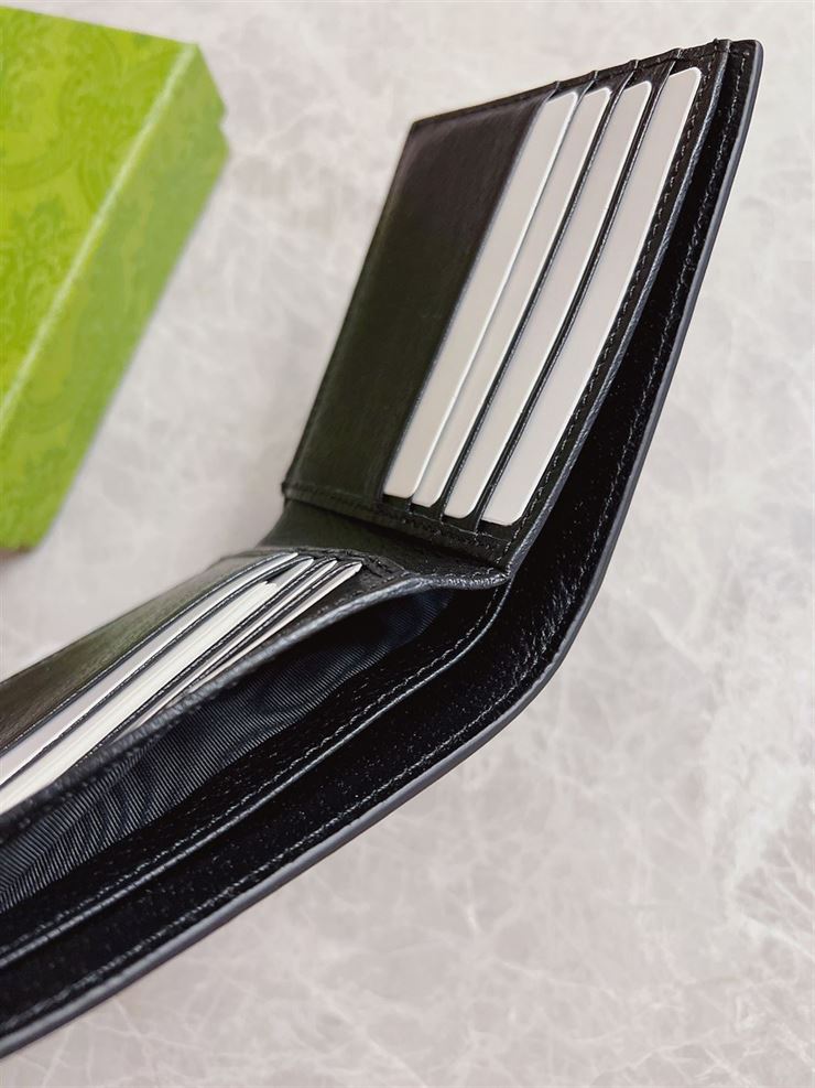 GUCCI GG MORMONT LEATHER BI-FOLD WALLET