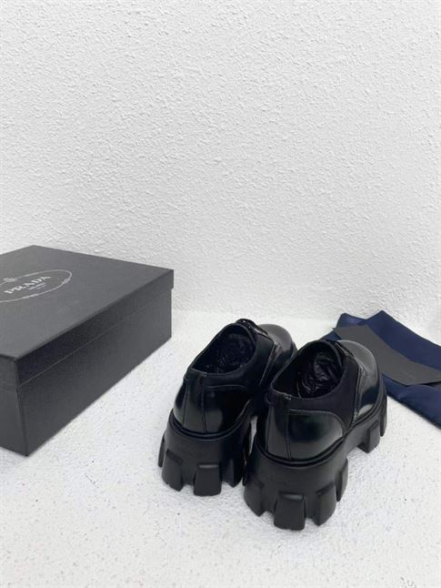 PRADA MONOLITH BRUSHED LEATHER AND NYLON LACE-UP SHOES - PRS068