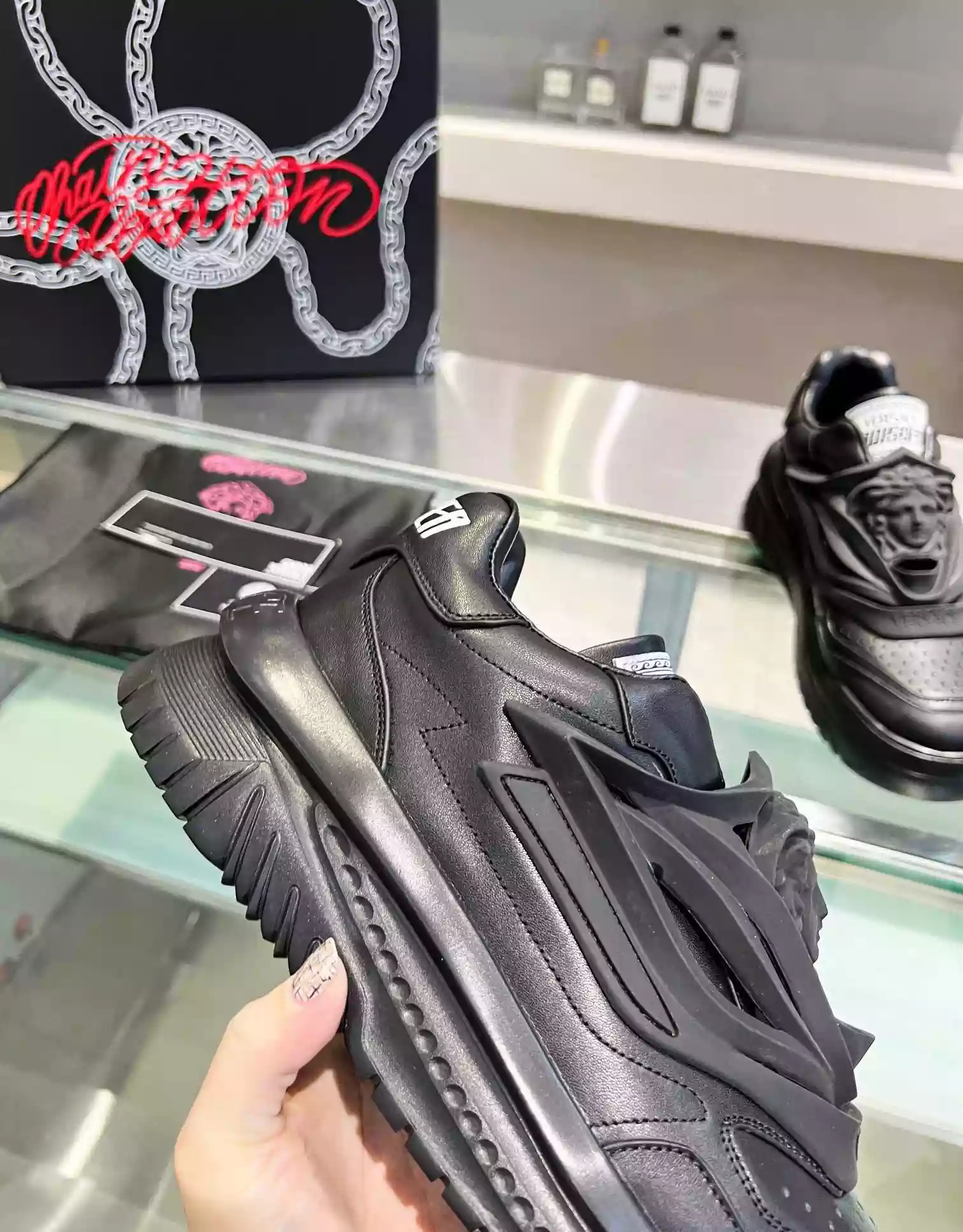 VERSACE WOMEN'S ODISSEA SNEAKERS IN BLACK LEATHER - VSS017