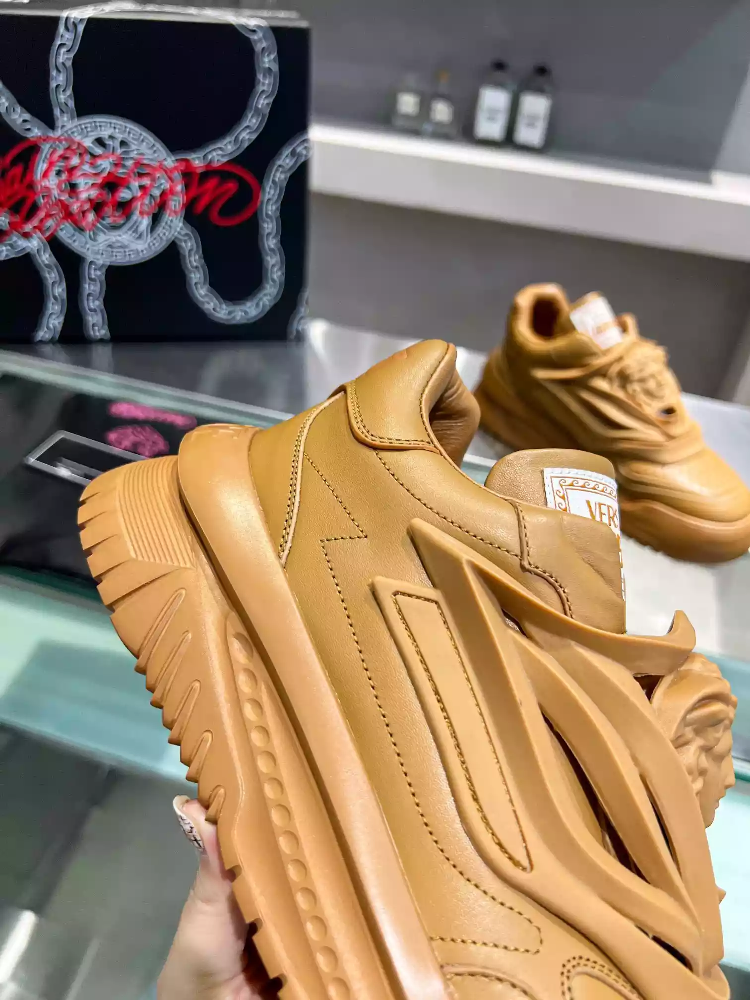 VERSACE WOMEN'S ODISSEA SNEAKERS IN BROWN LEATHER - VSS016