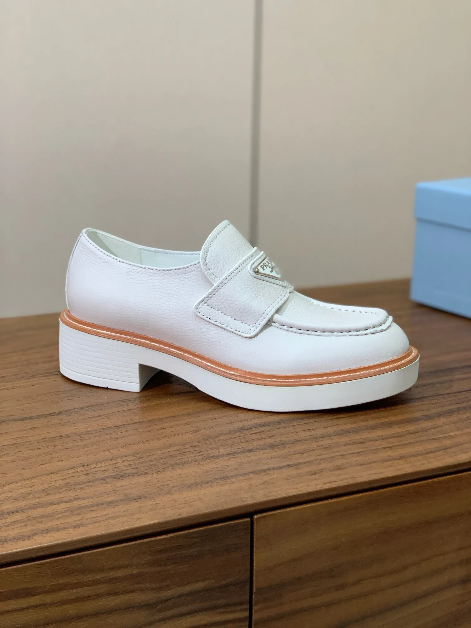 Prada Women's Loafers in White Grained Leather - PRL010 Prada Women's Loafers in White Grained Leather