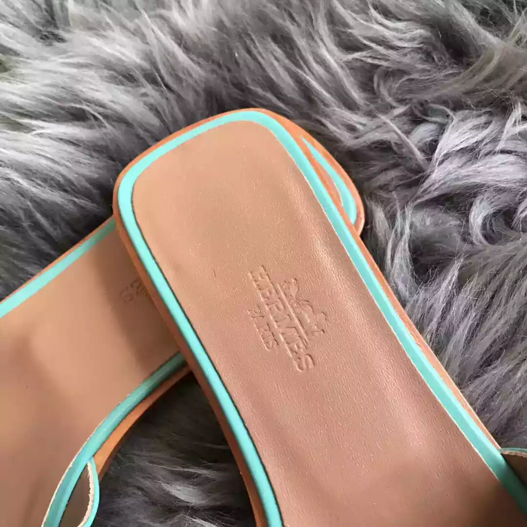 HERMES ORAN SLIDE SANDALS IN BLUE ATOLL SWIFT CALFSKIN - HMSD123