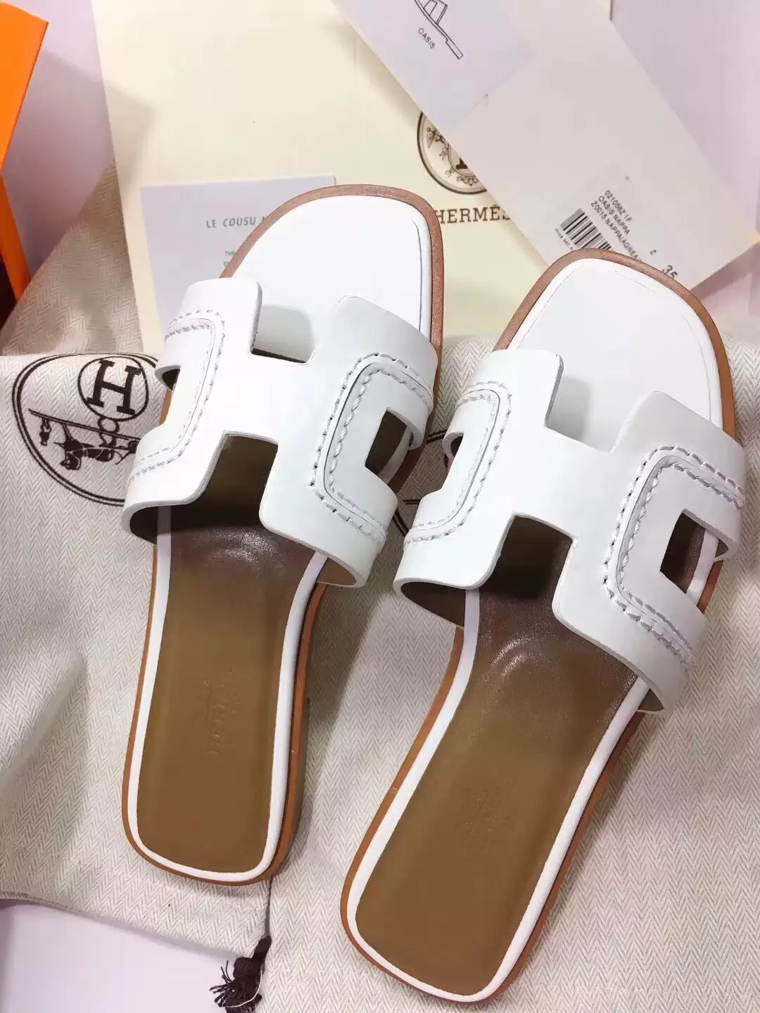 HERMES ORAN SLIDE SANDALS IN WHITE LEATHER WITH STITCHED - HMSD045