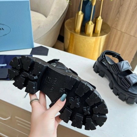 PRADA MONOLITH FLATFORM SANDALS IN BLACK NAPPA LEATHER - PSD019