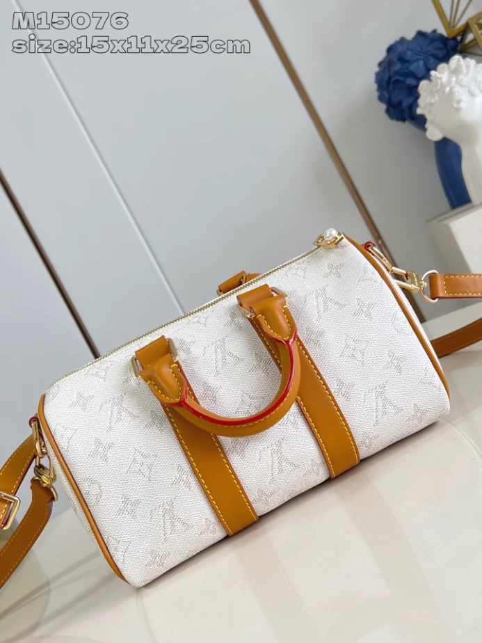 KEEPALL BANDOULIERE 25 BROWN MONOGRAM HERITAGE CANVAS M15076 - LW417 DISCOVERY BACKPACK PM SKY BLUE MONOGRAM CANVAS